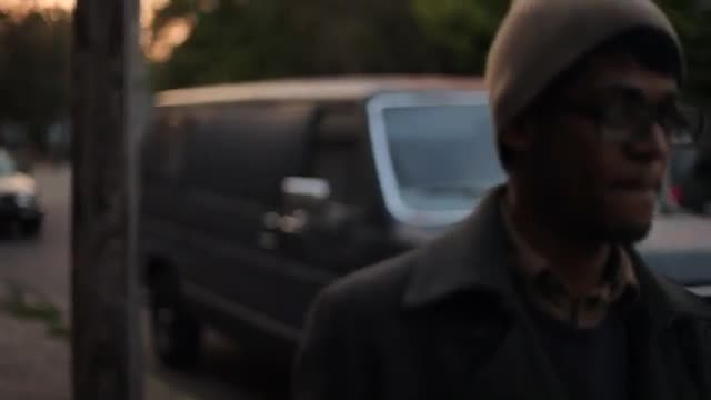 Young man smiling an...