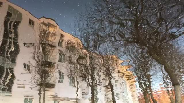 Buildings refelcted in a...