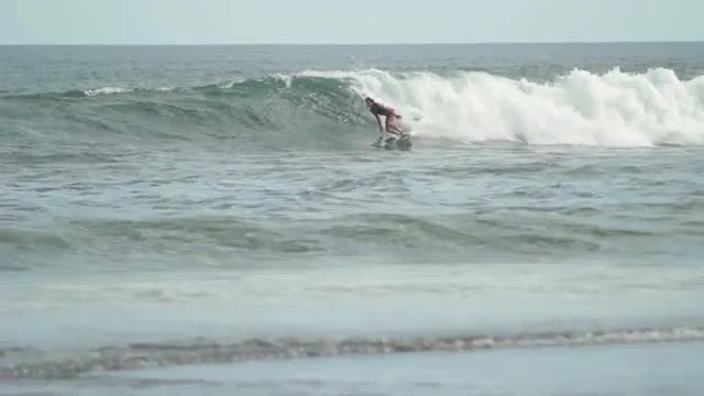 Girl is Riding on the Waves