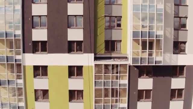 Flight Downward near Residential Multistory Quarters