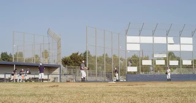 MS TS Baseball players playing in baseball diamond