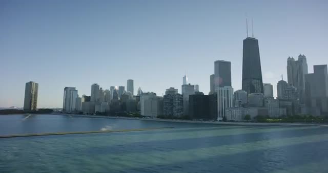 WS POV Cityscape in front of sea