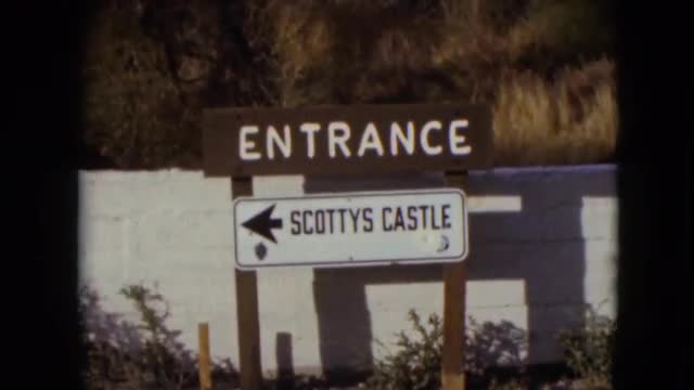 1957: signpost for the entrance to scotty's castle LAS VEGAS, CALIFORNIA