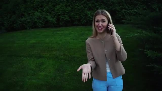 Young Beautiful Blond Female Talking on Phone Angry, Indignant, Expressed Claim