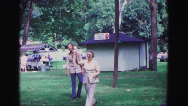 1971: a man and woman outdoor playing a game of lawn darts OMAHA, NEBRASKA