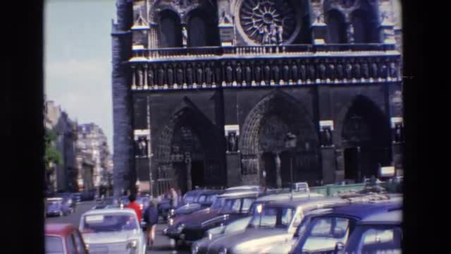 1969: amazing and historical building on a crowded and noisy street PARIS, FRANCE