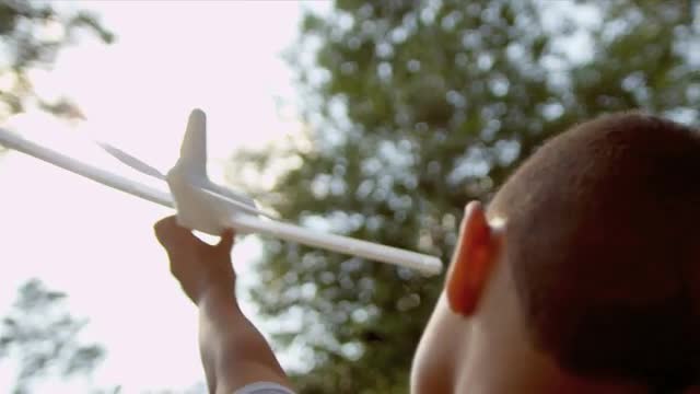 Playing with Toy Airplane
