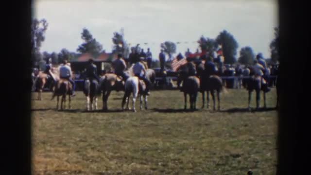 1957: group of people supporting their country riding horses WHEELING OHIO