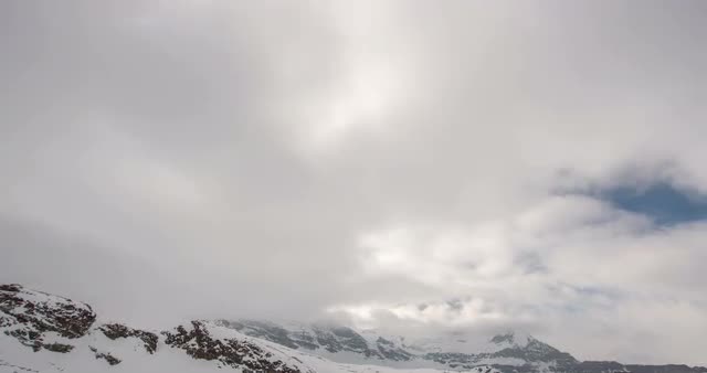 Heavy clouds on mountaintop 