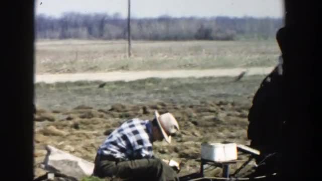 1954: the farmers ploughing the land with a tractor for farming WISCONSIN DELLS WISCONSIN