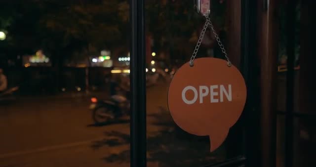 Changing store door sign from Open to Close at night