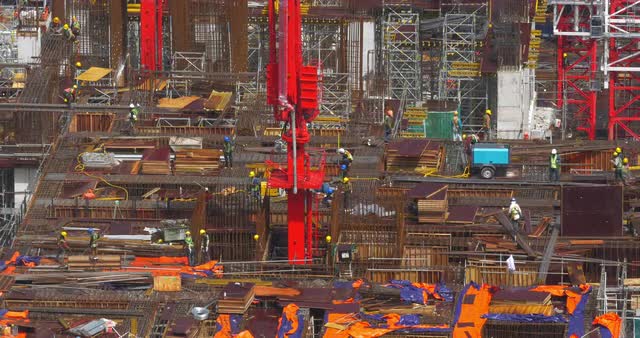 View of construction area with builders in work. Kuala Lumpur, Malaysia