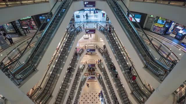 Timelapse of people traffic in multistorey trade centre