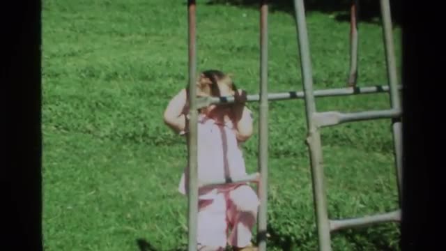 1979: a toddler climbing up stairs CALIFORNIA