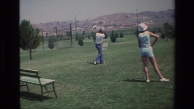 1976: man and wife out golfing LAGUNA HILLS CALIFORNIA