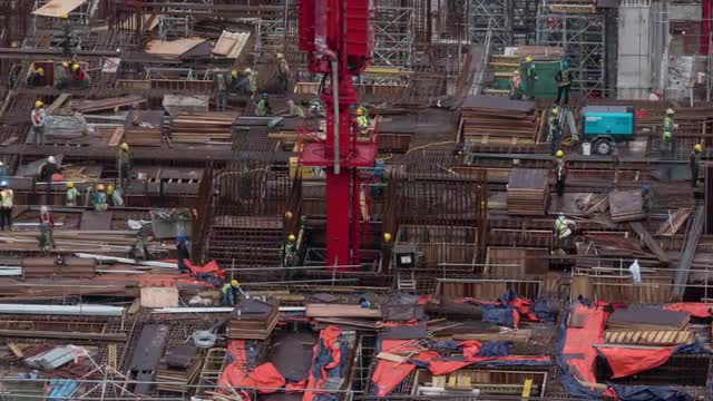 View of construction area with builders in work. Kuala Lumpur, Malaysia