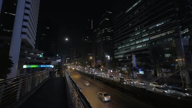 Busy traffic on night roads of Bangkok, Thailand