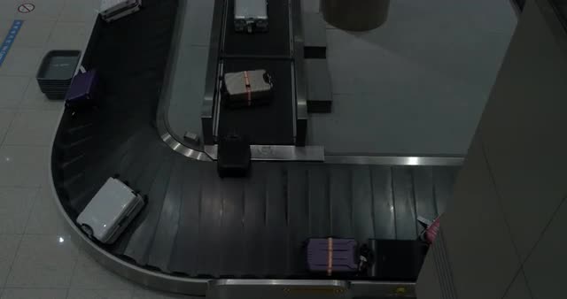 Baggage arriving to conveyor belt in the airport