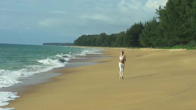 Running Woman Jogging On Beach