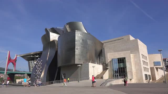 Stunning pan down of the famous Bilbao Guggenheim museum