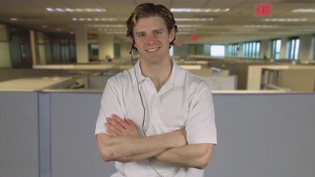 Friendly male customer service rep in an office