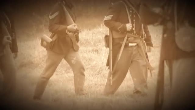 Civil War soldiers marching across field (Archive Footage Version)