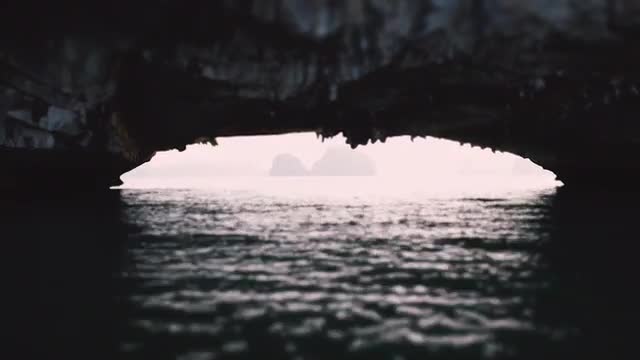 MS View of natural rock arch in Ha Long Bay / Vietnam