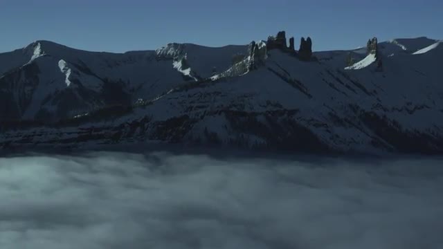 Bed of Clouds in Mountain Range