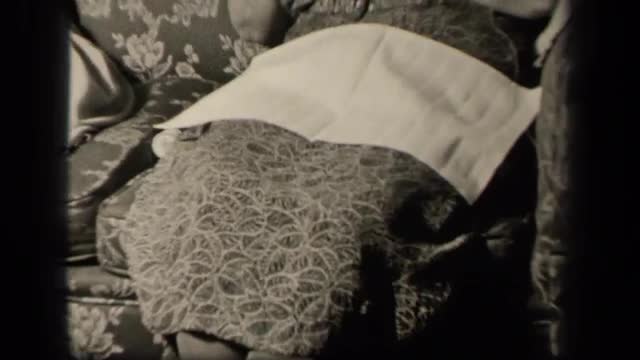 1942: lady threading needle. SEBRING OHIO
