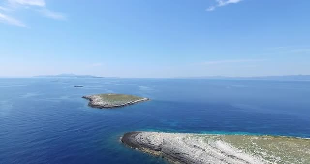 Aerial drone scene of transparent rocky coast at Croatia. Virgin island. Detail of transparent water