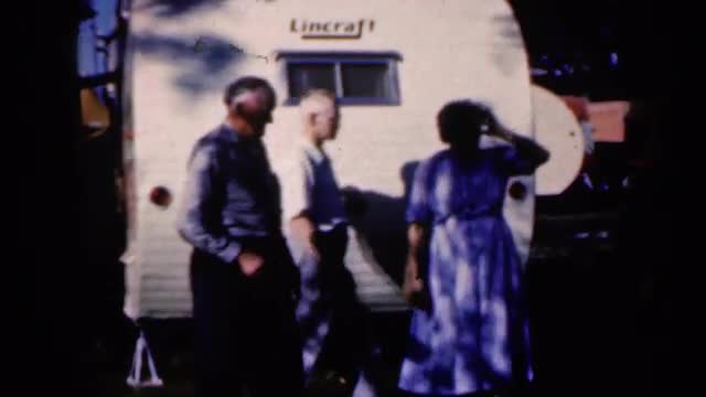 1959: one old man drive black tractor on grassland for expo IOWA
