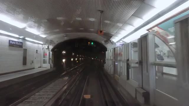 Metro subway station POV from moving train