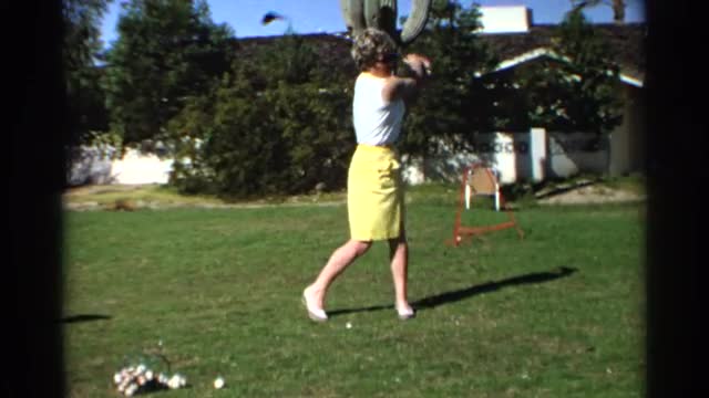 1968: scene of middle-aged woman golfing SCOTTSDALE ARIZONA