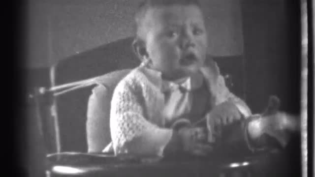 1939: the little child hand give the doll take a hand but another person collect the doll so watch t