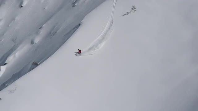 A skier riding a spine in Japan