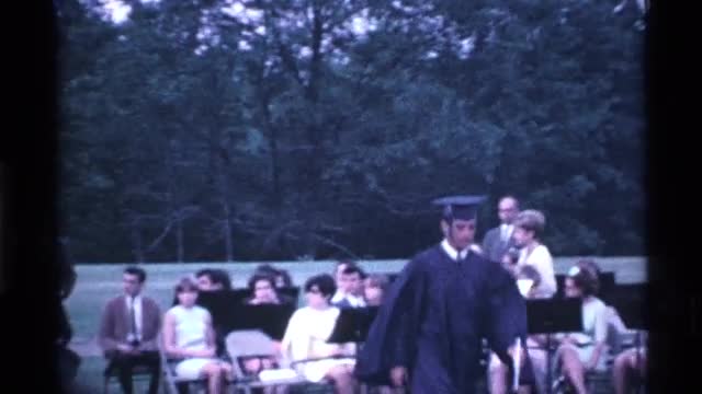 1969: a college convocation program a young collect go the stage in our finish for degree certificat