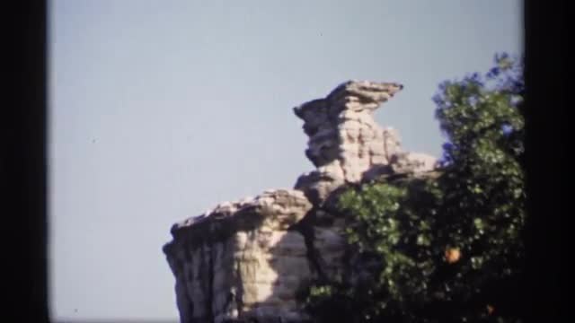 1969: view of different rock formations high up in the hillside in the forest WISCONSIN