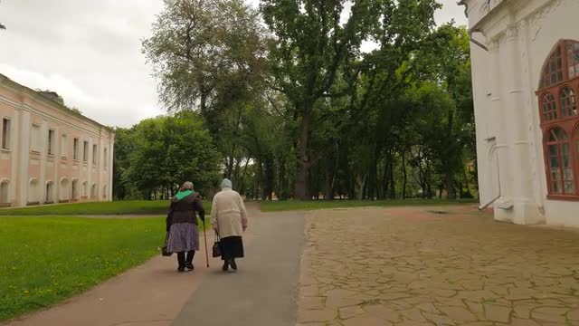 Elderly Women Walk by Church Courtyard Alley Taken From Behind the Corner Orthodox Cathedral Archite