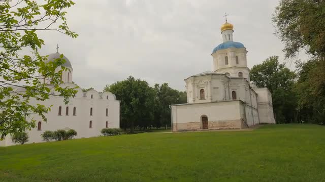 Two Cathedrals on Green Fresh Hill in Springtime Park is Around Famous Buildings of Ukraine Travelin