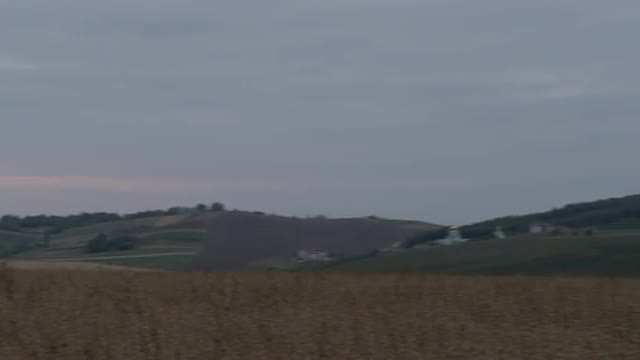 Church Bell Tower on a Horizon at the Field Sunset at Open Space Beautiful Evening Landscape Steppe 