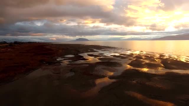 Aerial view lowering to the ground of lake Aerial view lowering to the ground of lake