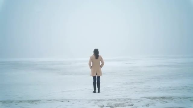 Woman On Snow Field