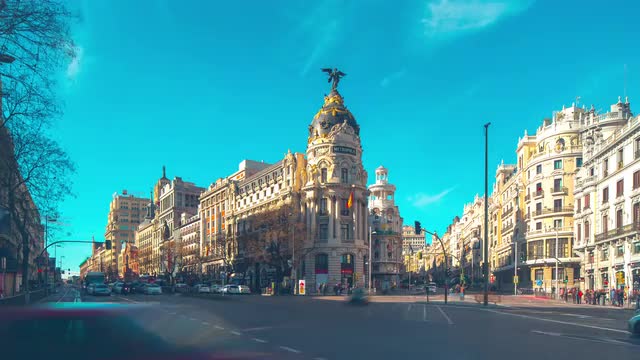 sunny day traffic gran via madrid metropolis panorama 4k time lapse spain