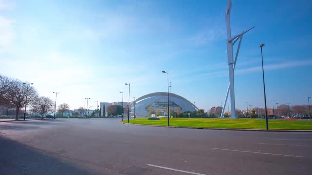 spain day light valencia traffic circle opera building view 4k time lapse