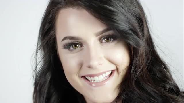 View of attractive young woman smiling