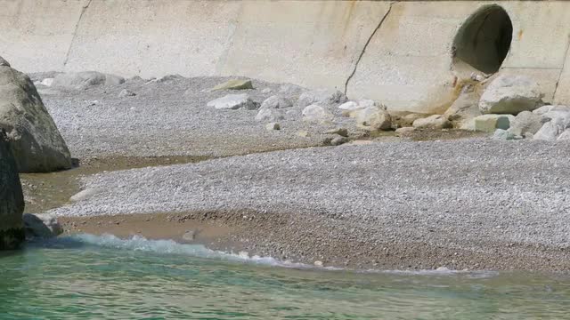 Pipe Discharging Water Into The Ocean