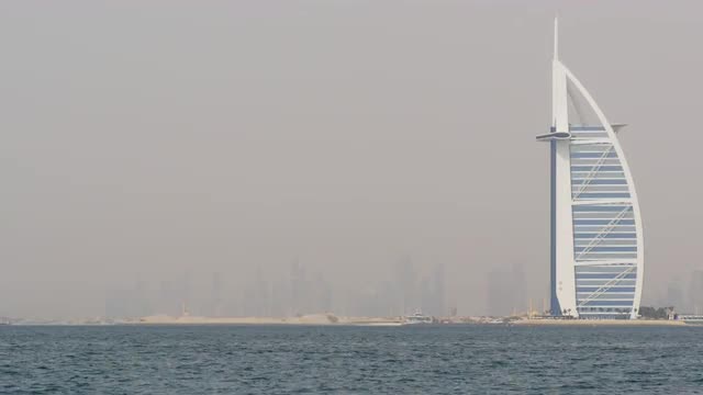 dubai city summer time famous hotel smog panorama 4k uae