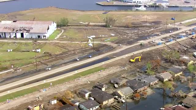 WS POV AERIAL Destruction caused due to natural disaster in suburban area / United States