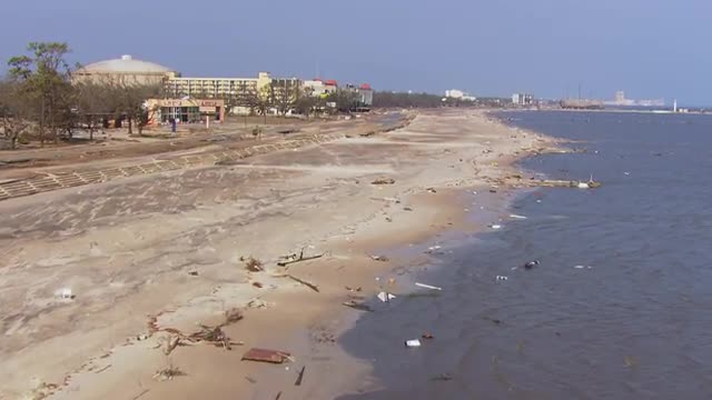 WS POV AERIAL Beaches filled with debris due to natural disaster / United States