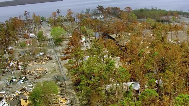 MS POV AERIAL Houses destructed after natural disaster / United States